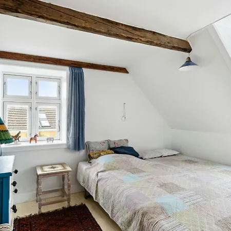 With Nostalgic Fisherman's House Vibe